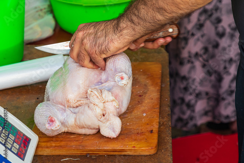 Fresh chicken for sale at a market in Bukhara.