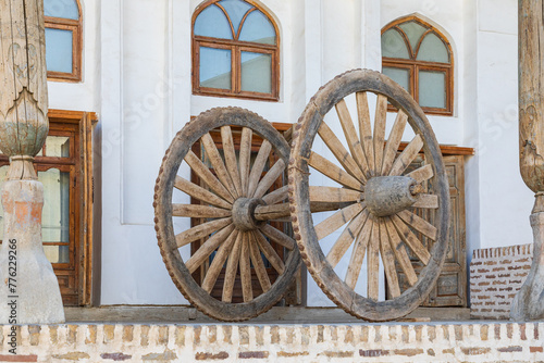 Antique wooden spoked wheel in Bukhara.