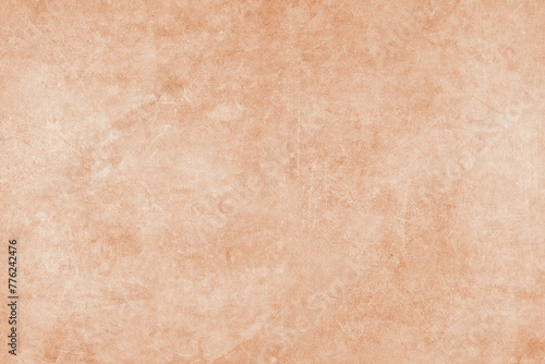 Painted orange grungy concrete background texture. Abstract wallpaper  shabby stone wall  vintage stucco surface  studio backdrop