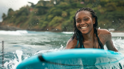 surfer lying on her surfboard and smiling happily while floating in the sea generative ai