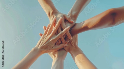 Group of People Putting Their Hands Together