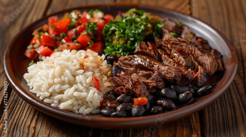The dish of Venezuela. Pabellin Criollo is a traditional Venezuelan dish consisting of black beans, white rice and pieces of steak cooked with tomatoes.