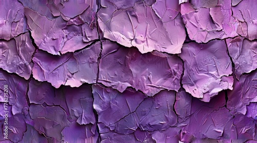  A tight shot of a purplish wall, displaying flaking paint along its edges, with fresh coats of purple paint applied to its outer surface