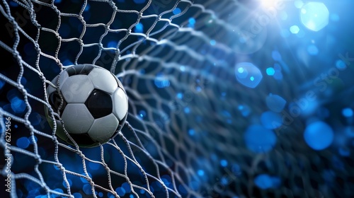 Football soccer ball on football play, flying ball net over blue background with copy space, goal concept © neirfy