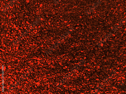 Abstract red background from instant coffee granules. Background texture close up. Imitation Small stones. For the design of forms, brochures, websites.