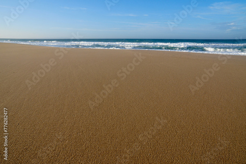 sand beach with waves