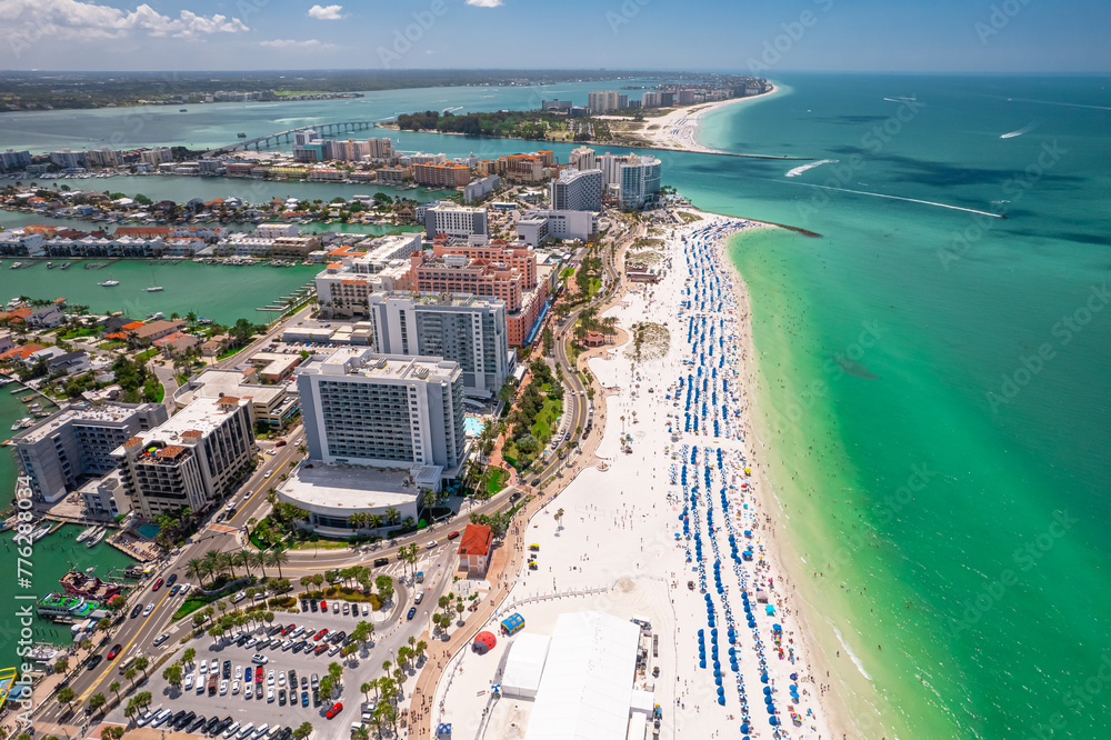 Clearwater Beach Florida. Florida beaches. Panorama of city. Spring or summer vacations. Beautiful view on Hotels and Resorts on Island. Blue color of Ocean water. American Coast. Gulf of Mexico shore