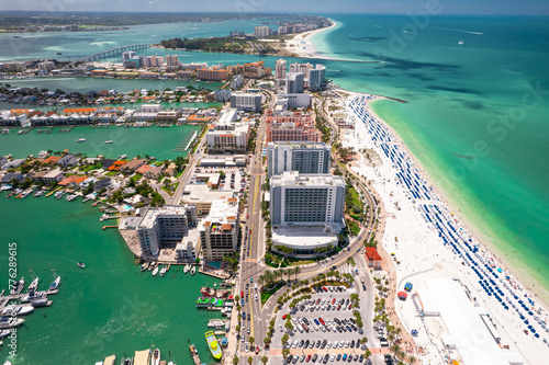 Clearwater Beach Florida. Florida beaches. Panorama of city. Spring or summer vacations. Beautiful view on Hotels and Resorts on Island. Blue color of Ocean water. American Coast. Gulf of Mexico shore