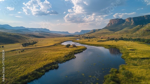 River Flowing Through Lush Green Valley