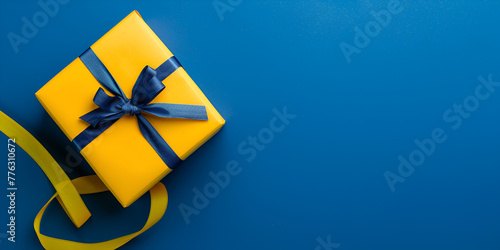 
blue gift box tied with yellow ribbon isolated on transparent background