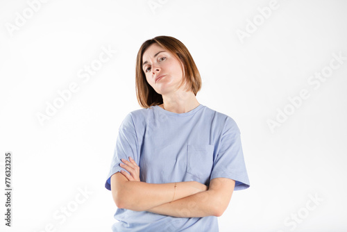 Upset and depressed young woman feeling bad isolated on white background 