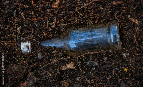 Vergrabene Glasflasche