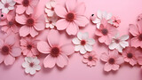 Pink flowers on a pink background. Flat lay. top view.