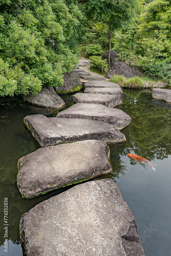 Large flat rocks forming a path over a Japanese pond.
Koko-en zen garden near Himeji castle.
