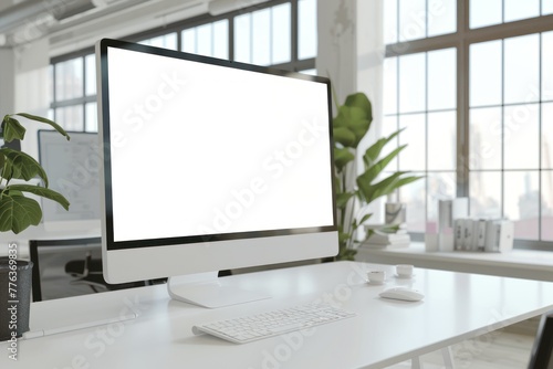 Computer display mock-up with empty white emockup in bright modern office
