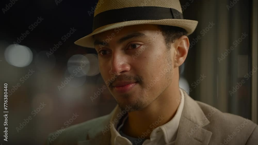 Young Man Waiting Alone at Train Station Platform at Night Young Man Waiting Alone at Train Station Platform at Night