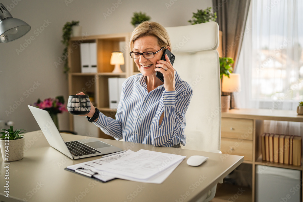 Mature woman business make a phone call at work talk happy smile Mature woman business make a phone call at work talk happy smile