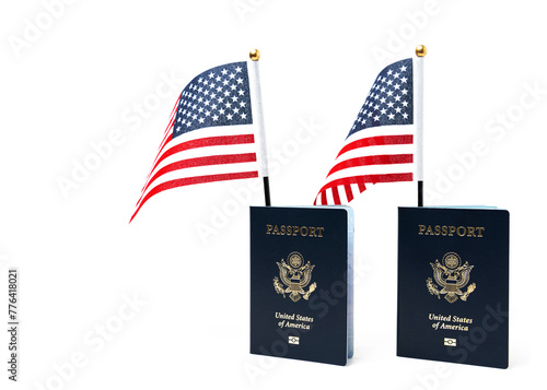 Us passport and american flag close up on a white background. © kosoff