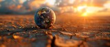 Planet with dry cracked desert landscapes facing global water shortage and warming. Concept Global warming, Water shortage, Desert landscapes, Environmental crisis, Sustainable solutions