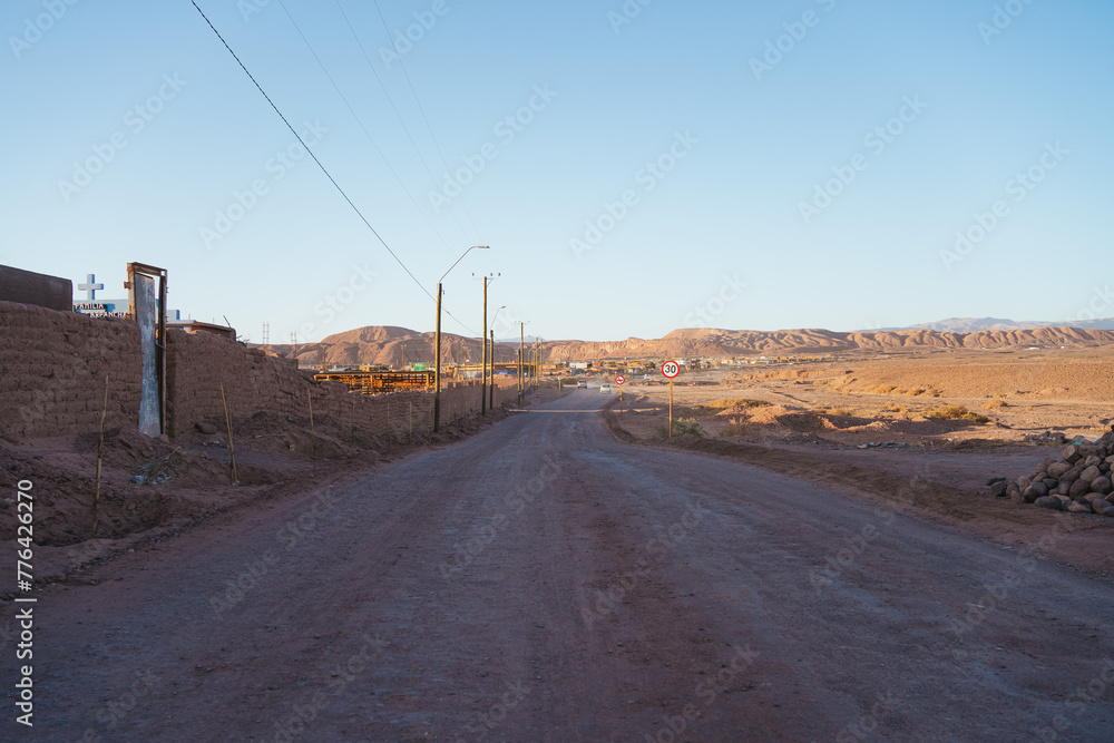 Deserted dirt road in rural San Pedro de Atacama, Chile.