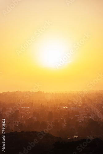 San Fernando Valley sunburst sunrise vertical view.  Photograph taken at Santa Susana Pass State Historic Park in the Chatsworth neighborhood of Los Angeles California. © trekandphoto