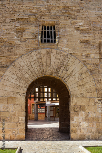 The 14th century  stone gate Porta del moll in Alcudia old town, Mallorca, Spain, Balearic Islands photo