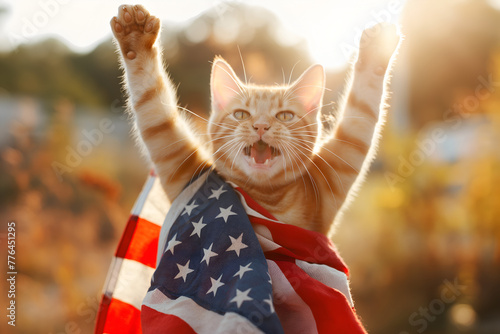 Funny happy patriot cat in New York street with big America flag celebrating 4th of July Independence Day