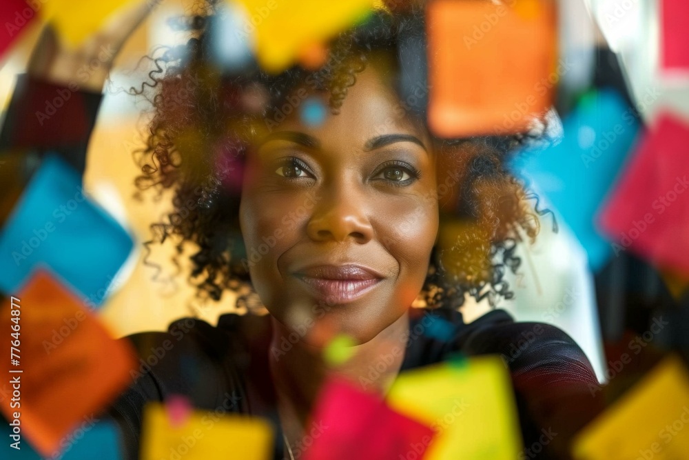 A woman with curly hair looking at a bunch of post it notes. Generative AI. A woman with curly hair looking at a bunch of post it notes. Generative AI.