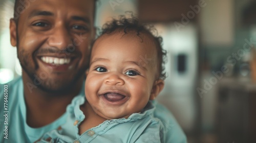 A man holding a baby smiling at the camera. Generative AI.