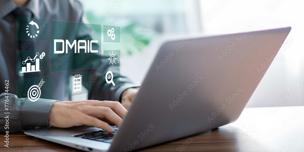 A businessman using laptop on DMAIC concept. Define, Measure, Analyze, Improve and Control. A businessman using laptop on DMAIC concept. Define, Measure, Analyze, Improve and Control.