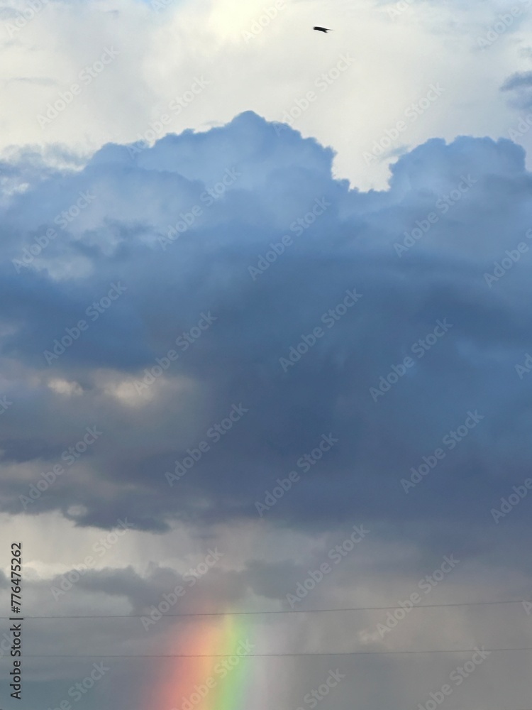 Obraz premium Rainbow and clouds in the sky