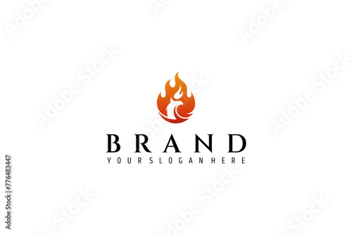 Fire logo with eagle head silhouette inside. Simple flat phoenix bird logo