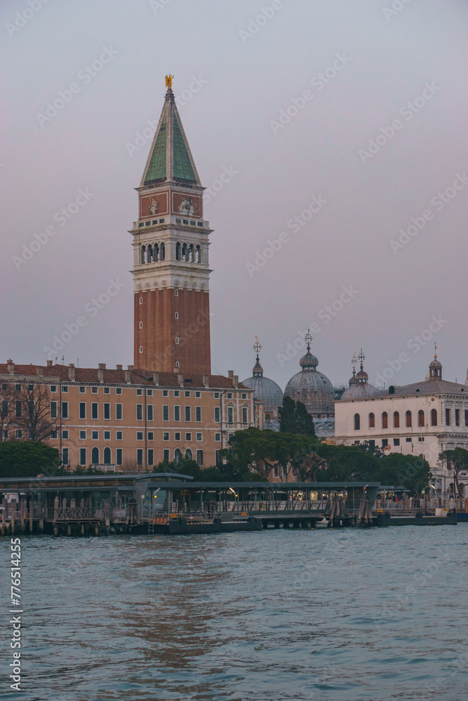 View from sea of Piazza San Marco Campanile and Doge Palace on a hazy winter evening, Venice, Veneto, Italy
