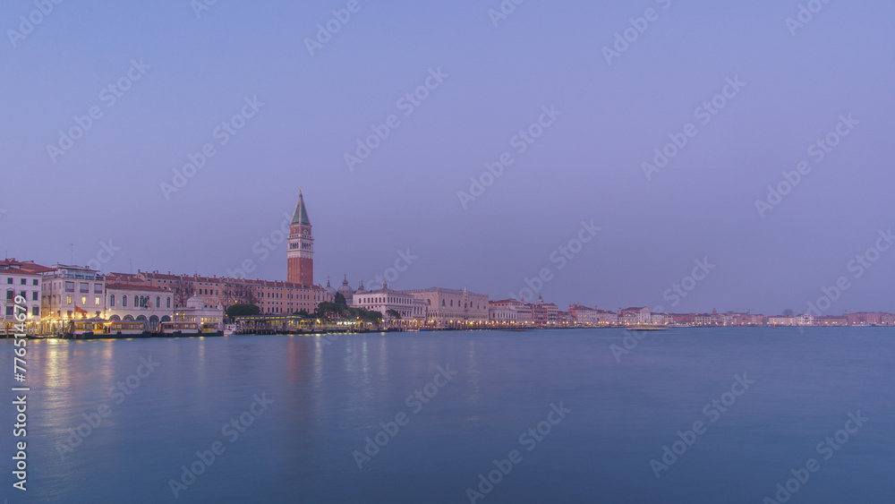Panoramic view from sea of Piazza San Marco Campanile and Doge Palace during blue hour, Venice, Veneto, Italy