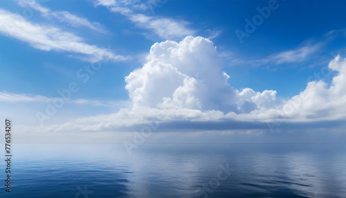 Beautiful blue sky  with fluffy clouds over the calm ocean