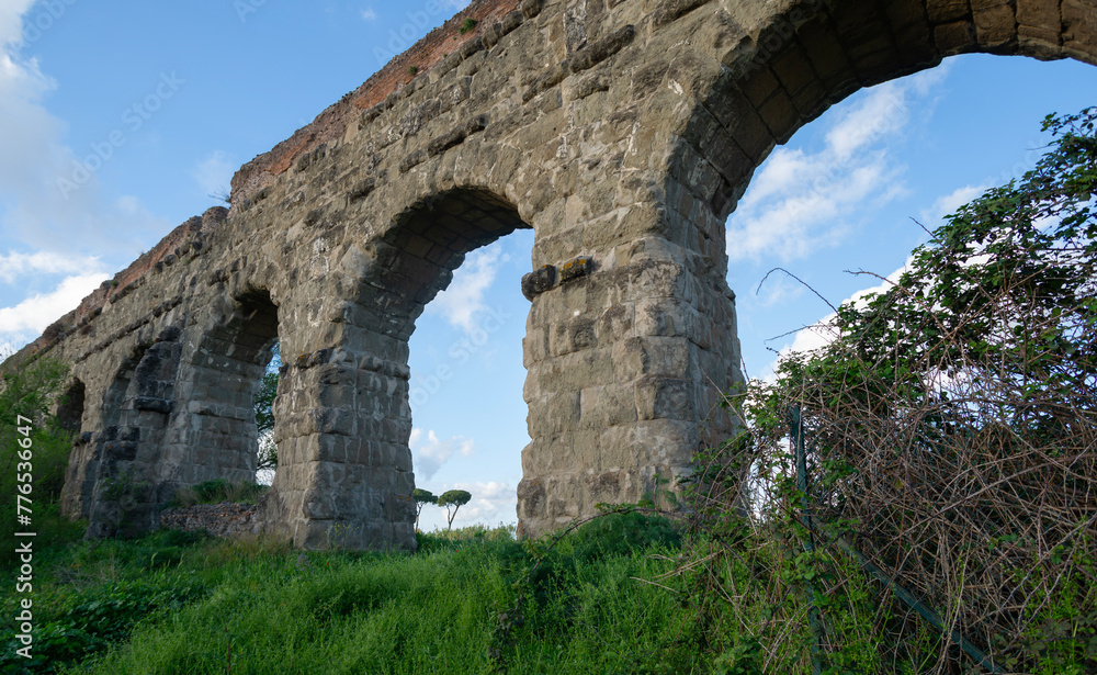 Ruins of the ancient Acqua Claudia aqueduct at Parco degli Acquedotti, Rome, Italy
