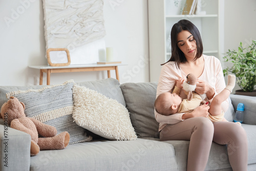 Young woman with toy and he...