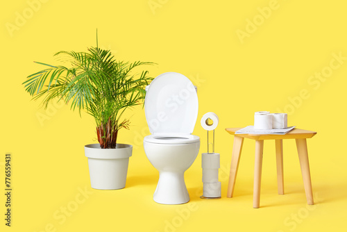 Toilet bowl with paper roll...