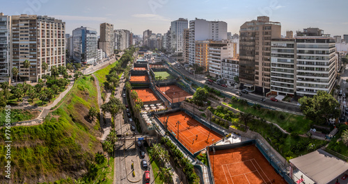 Panoramic aerial image of the heart of Miraflores, showing the buildings and a tennis club on the Bajada Balta in Lima, Peru. photo