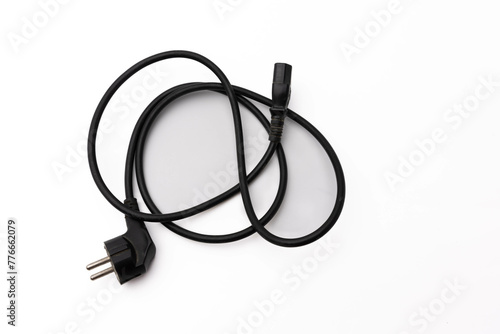 Black power cord on white background