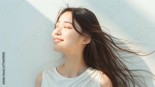 美しい髪が靡いているアジア人女性 AI生成画像