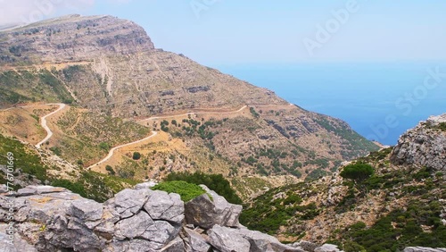 Hiking trail from Raches to Magganitis via Randi forest on Ikaria island, Greece longevity blue zone nature landscape view on winding road photo