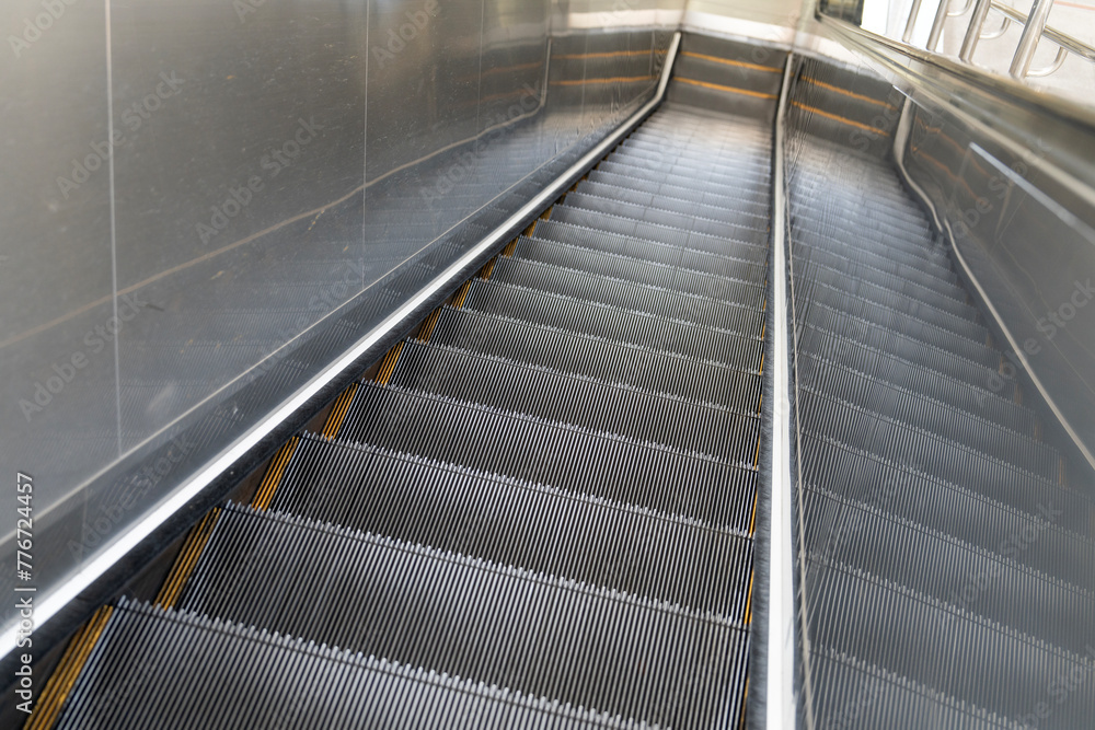 View of the escalator in the subway station View of the escalator in the subway station