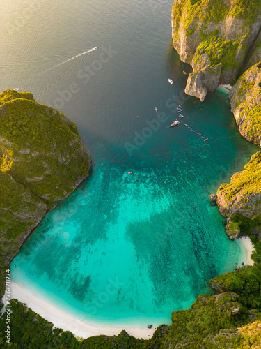 Aerial view of a tropical Maya bay beach with turquoise water and white sand © Amazing Travel Stock