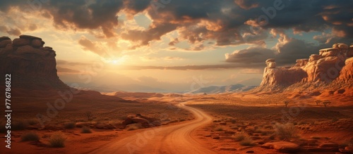 A scenic view of a dusty dirt road winding through the desert landscape with a beautiful sunset in the background photo