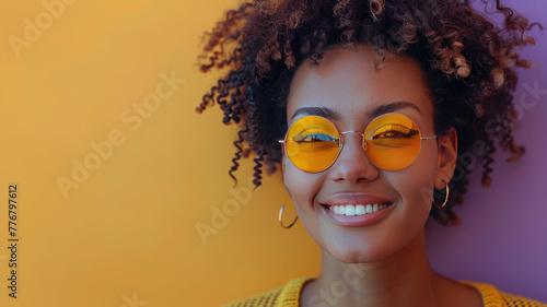 happy woman with yellow sunglasses and sweater on isolated pastel orange background, with purple shapes behind her,generative ai photo
