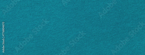 Texture of blue and turquoise color background from felt textile material, macro. Vintage cerulean fabric cloth,