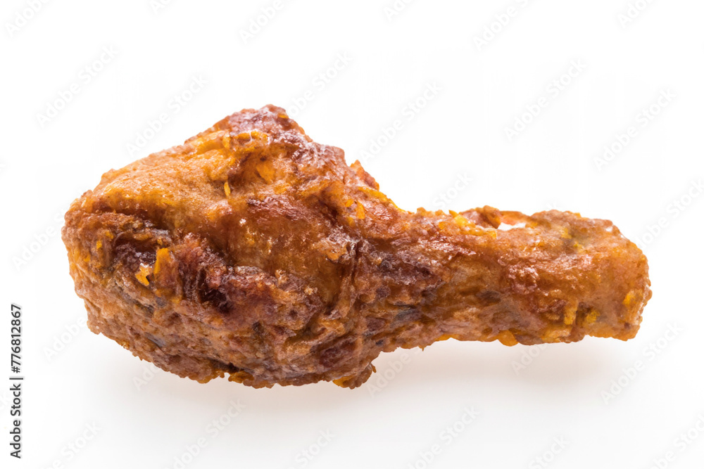 Isolated fried chicken wings and legs on a white plate, ready for a delicious meal Isolated fried chicken wings and legs on a white plate, ready for a delicious meal