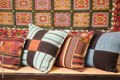 Colourful cushions on display for sale in a traditional Turkish Bazaar.