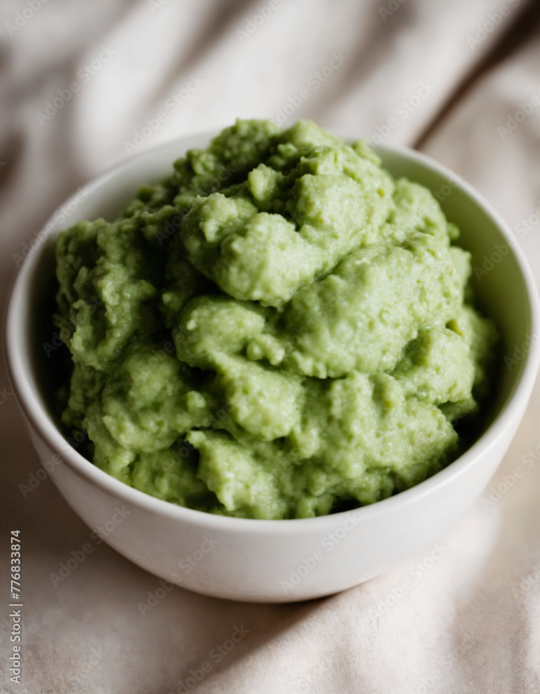 Vibrant Green Puree Served in a White Bowl Vibrant Green Puree Served in a White Bowl